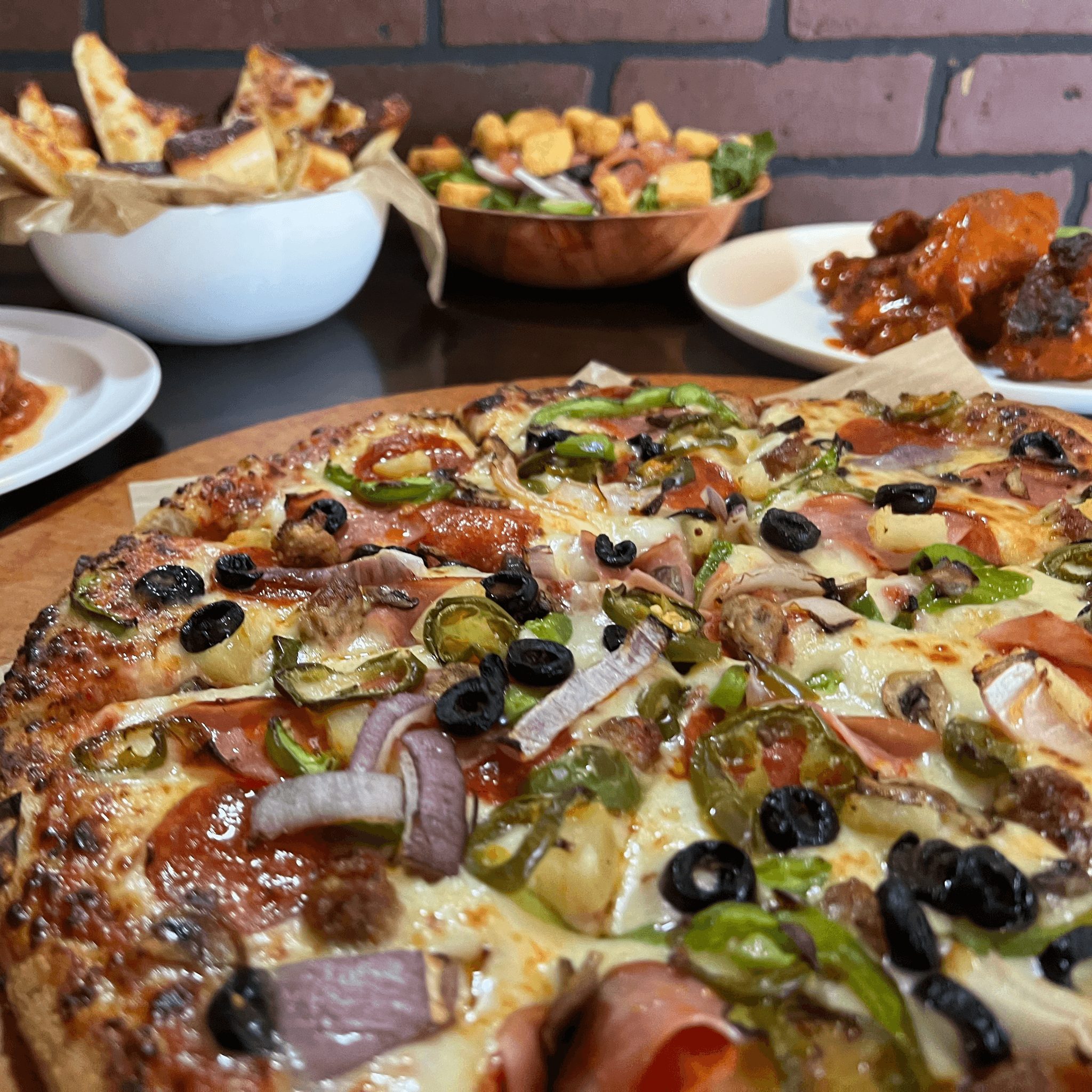 Giant Family Special  (Giant 28" pepperoni pizza, 15 mozzarella sticks, and 20 wings).