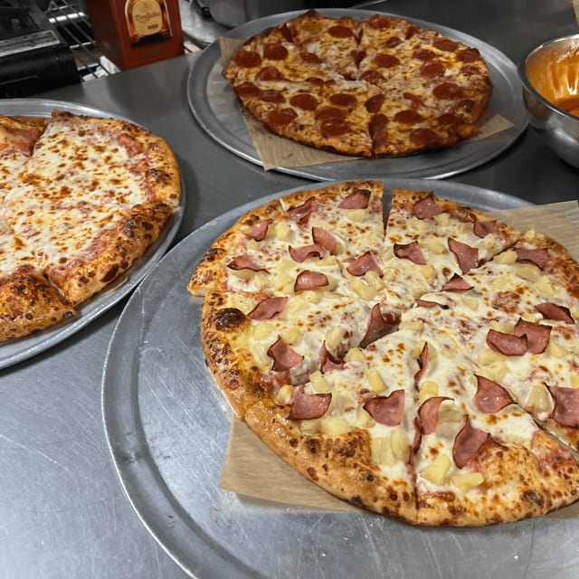 3 Medium 3 Topping Pizzas.
